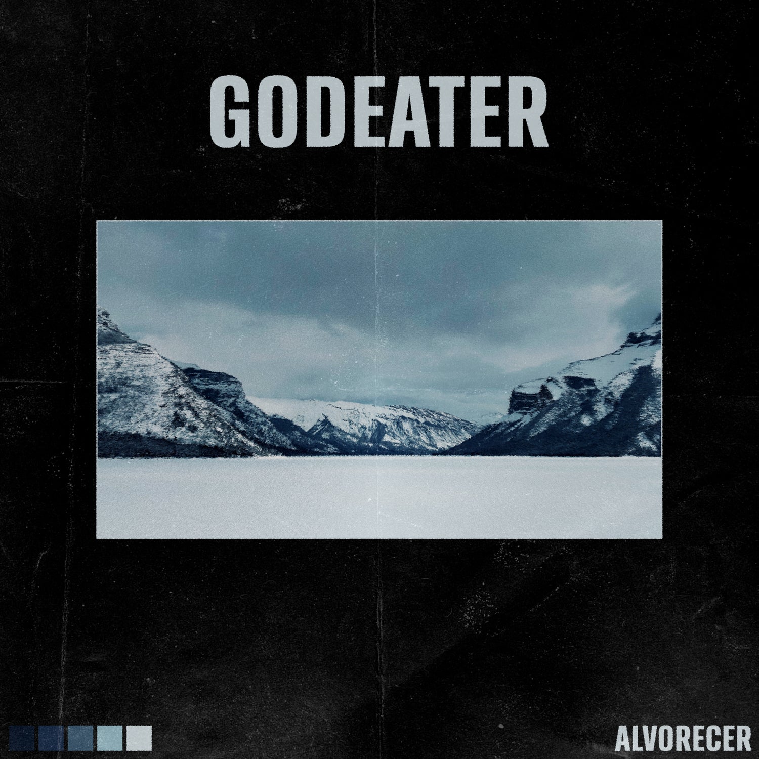 Album cover with snowy mountain landscape and 'Godeater' text on a dark background