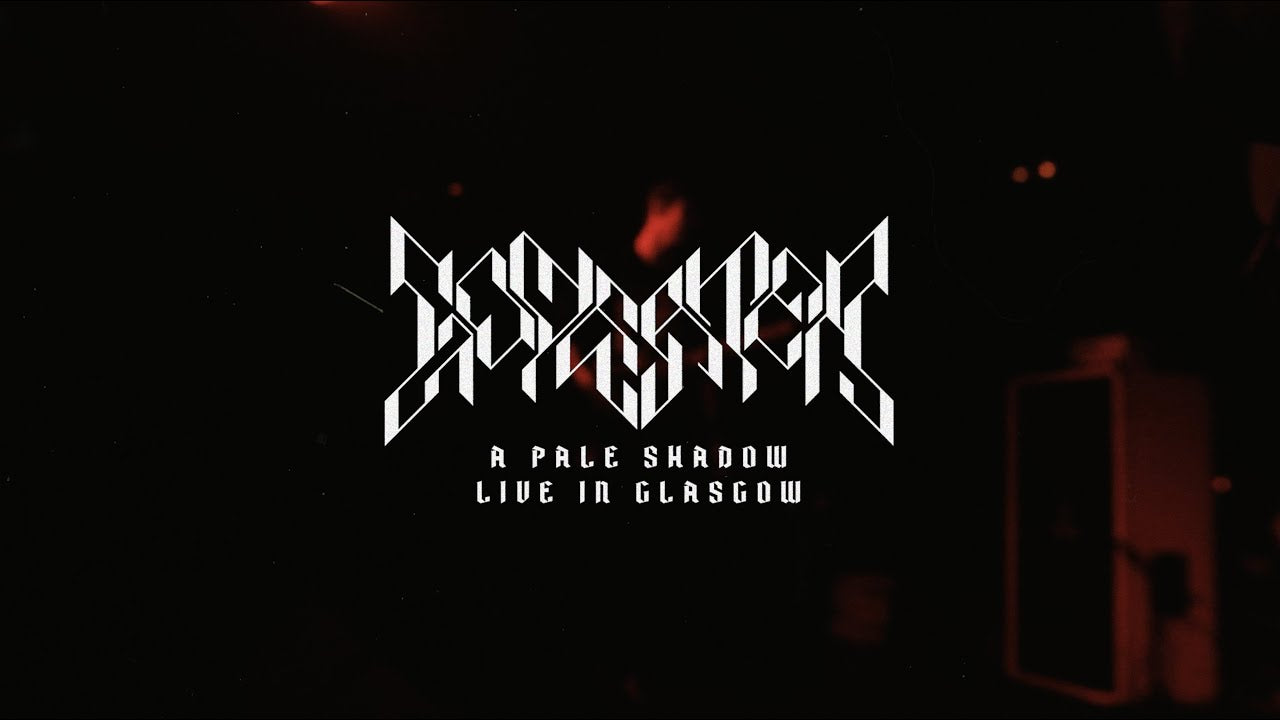 A darkened image of Godeater playing live. The text reads "Godeaer - A Pale Shadow, Live in Glasgow."